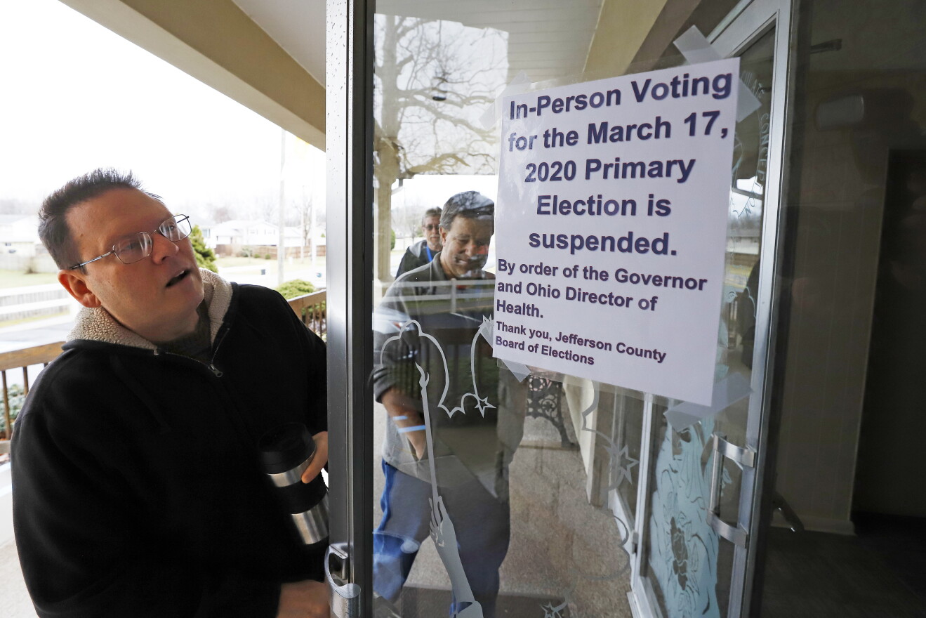 Jefferson County Elections arrive to pack up the polling place at Our Lady of Lourdes church in Wintersville, Ohio, Tuesday, March 17, 2020. Ohio's primary voting was postponed amid coronavirus concerns.